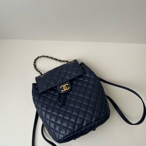 Chanel Dark Blue Quilted Backpack with Gold Accents
